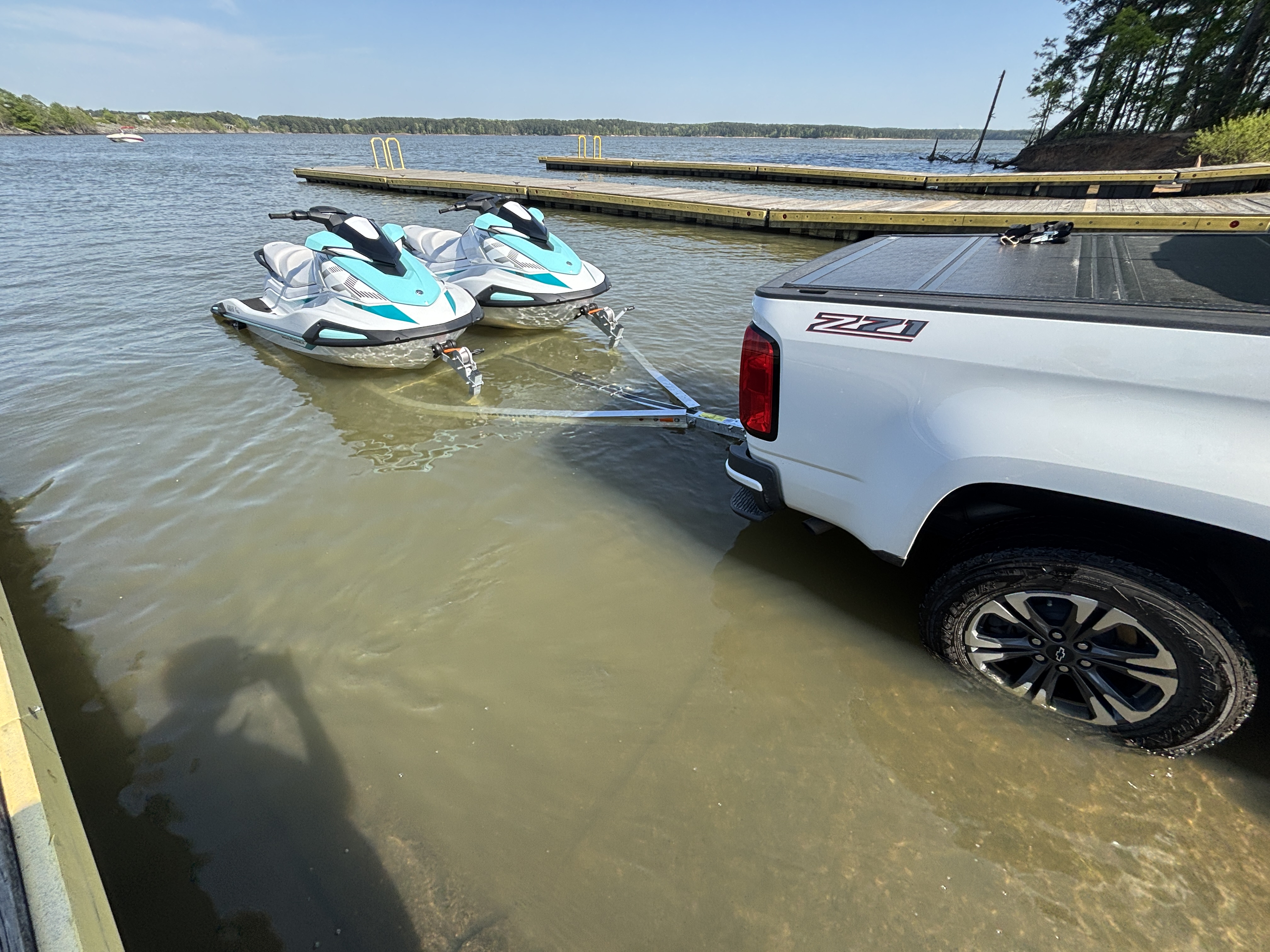 Triangle Powersports professional setup with Yamaha VX jet skis and trailer at Jordan Lake